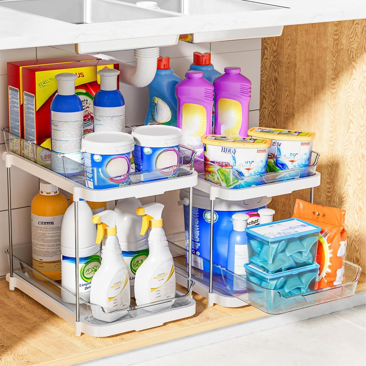 Pull-out organizers under a sink with cleaning supplies
