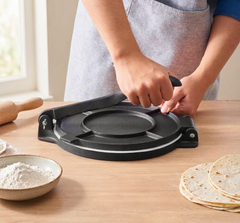Pressing dough with the reinforced ergonomic handle
