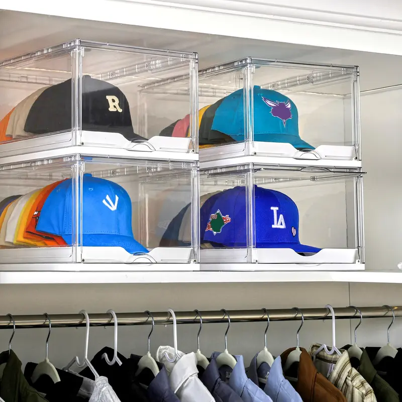 Organizer boxes on a closet shelf