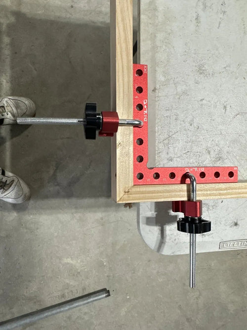 Customer photo - close-up of a clamp on a frame corner